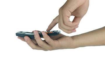 A man's hand holds a calculator isolated on a white background with clipping path.