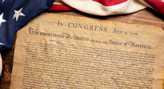 United States Declaration of Independence with a vintage American flag