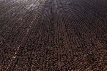 Fototapeta premium Aerial view of plowed and irrigated farm land