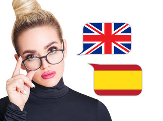 Blonde woman in glasses near dialogue frame with spanish and english flags. Speak language concept.
