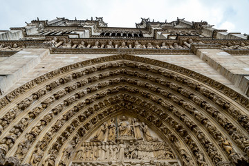 Last Judgement scene at central portal of the Notre-Dame de Paris cathedral west façade, Paris,...