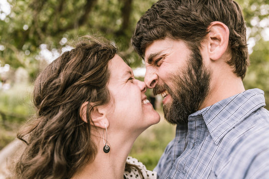 Couple rubbing noses together. Bridger, Montana, USA