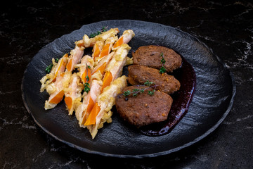meat sauce and potatoes on a plate