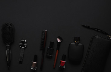 Accessories for women's beauty. Make up brush, watch, nail polish and hair straightener, all on a...