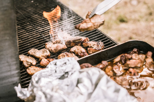 Close-up of BBQ Grill with chicken and ribs being grilled. Bridger, Montana, USA
