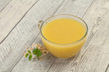 Dietary vegetarian oats milk over wooden