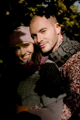 Young couple enjoying autumn atmosphere