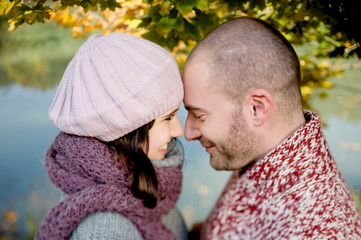 Young couple enjoying autumn atmosphere