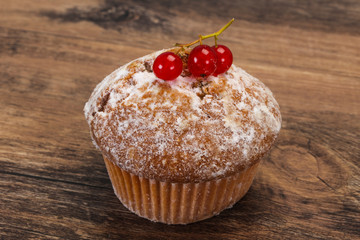 Sweet tasty muffin with red currants
