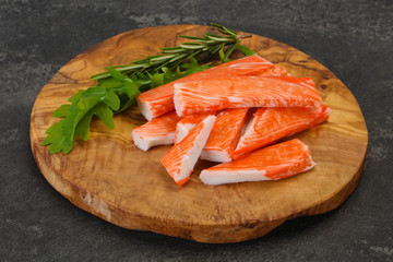 Crab stick surimi over board