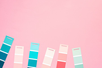 Selection of palette for painting, sample color catalog on a pink background, different shades of...