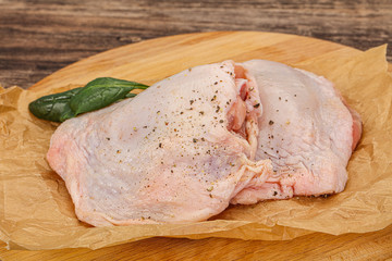 Raw chicken hip with spices