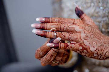 Hands of Newlywed Bride Wearing Ring and Bangles and Nice Henna Design closeup | Asian Bride Hands with Henna Design Closeup