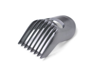 Plastic nozzle on the hair clipper with adjustable length of the haircut. Isolated on a white background with a shadow