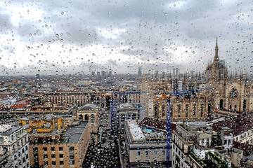 Milan - rain drop - duomo cathedral and skyline 