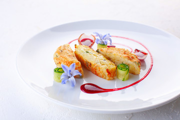 potato pancakes with cranberry sauce