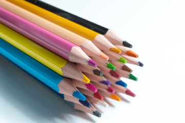 Set of coloured pencils on white