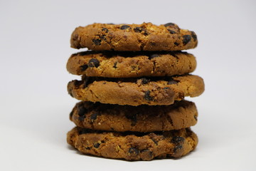 Fototapeta na wymiar a stack of delicious chocolate oatmeal cookies with sugar