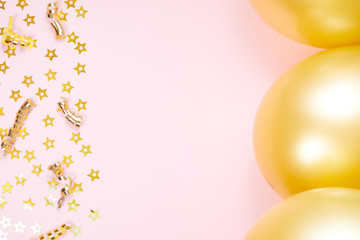 Valentines Day background concept with small stars, gold curved ribbon and Balloon on pink paper background.