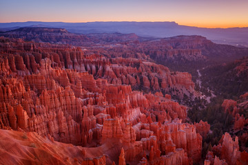 Inspiration Point during beautiful sunrise, with hoodoos - unique rock formations from sandstone...