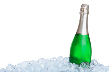 Ice cubes and bottle of champagne on white background
