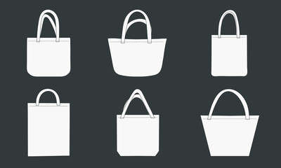 Set of white tote shopping eco fabric bags. Vector illustration of mockup blank template isolated on gray background. Canvas bags.