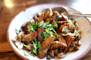 Fried potatoes with mushrooms