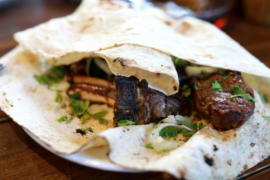 Fried Lamb Loin In Pita Bread