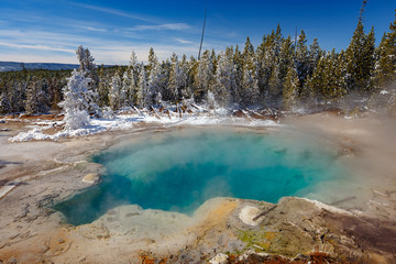 Emerald Spring at Norris Geyser Basin trail area, during winter in Yellowstone National Park,...
