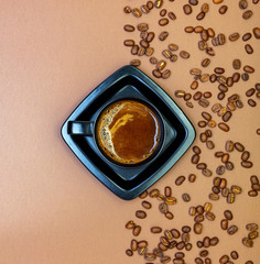 Coffee cup background with coffee beans.