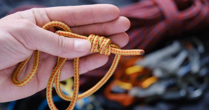 Prusik loop used as autoblock in climbing: close up showing the double fisherman knot.