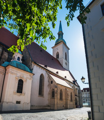 Obraz premium St Martin Cathedral in Old Town of Bratislava city, Slovakia, Slovak aged catholic Church under blue sky in summer