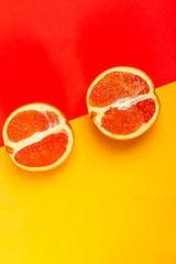 Top view orange fruit on yellow background. Food concept. Flat lay, copy space