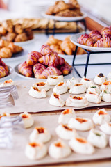 Pastry buffet served at charity event, sweet food and dessert table