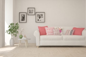 Modern living room in white color with sofa and pink pillows. Scandinavian interior design. 3D illustration