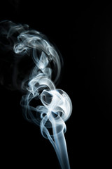 White smoke on black background