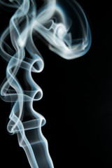 White smoke on black background