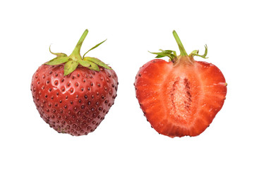 Halved ripe strawberries isolated on a white background