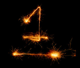 number one written with a sparkler on a black background