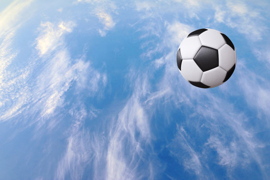 Soccer ball against of blue cloudy sky. Euro 2020 concept. Digital composition.