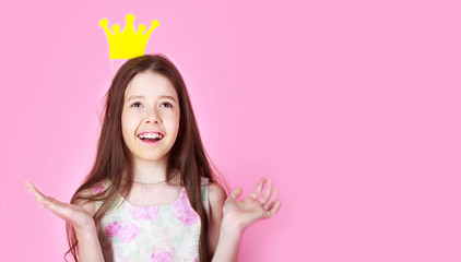 Little girl princess, crown, isolated on pink background. Kid wear golden crown symbol princess. Lady little princess. Girl wear crown pink background. Copy space