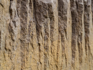 Detail of a rock with different cuts