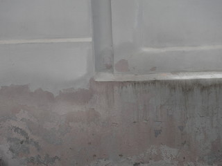 texture colored wall of an old building in a big city