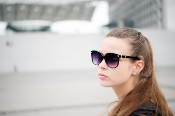 Naklejka premium Highlighting her best features. Sexy woman outdoors. Sensual woman wear fashion sunglasses. Pretty woman with long hair. Beauty look of young woman. Fashion and style. Beauty and youth