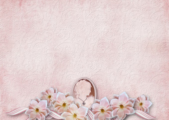 Vintage shabby background with a border of pink flowers and cameo