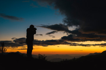 sunset photographer silhouette