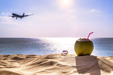Coconut water on a tropical beach