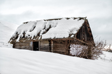 Winter village landscape in mountains