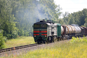 Fototapeta na wymiar diesel locomotive with freight train