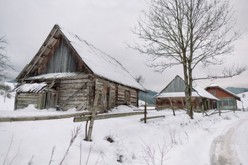 Winter village landscape in mountains